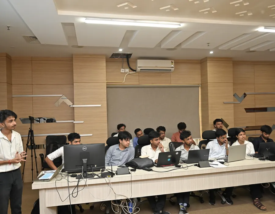 Interns at their workstations during a session